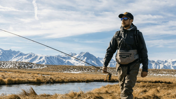 Man with Fishing rode outdoors